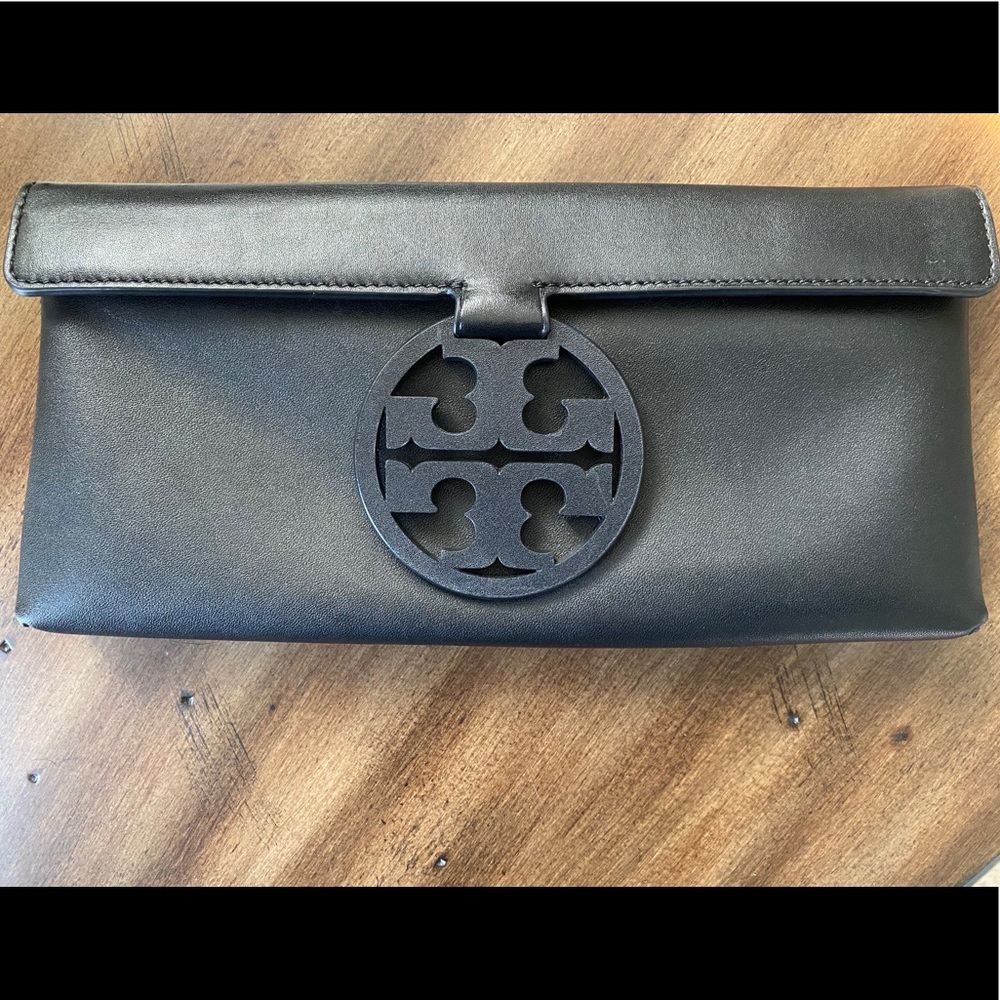 Gently used Tory Burch Miller clutch.